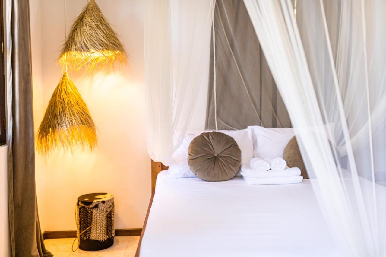 Kima Serviced Beach House & Suites 布韦朱 外观 照片